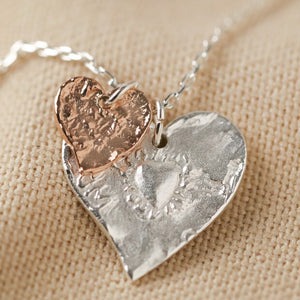 Textured double heart necklace in silver / rose gold