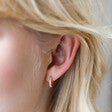 Load image into Gallery viewer, Baguette Crystal Huggie Hoop Earrings in Gold
