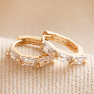 Baguette Crystal Huggie Hoop Earrings in Gold